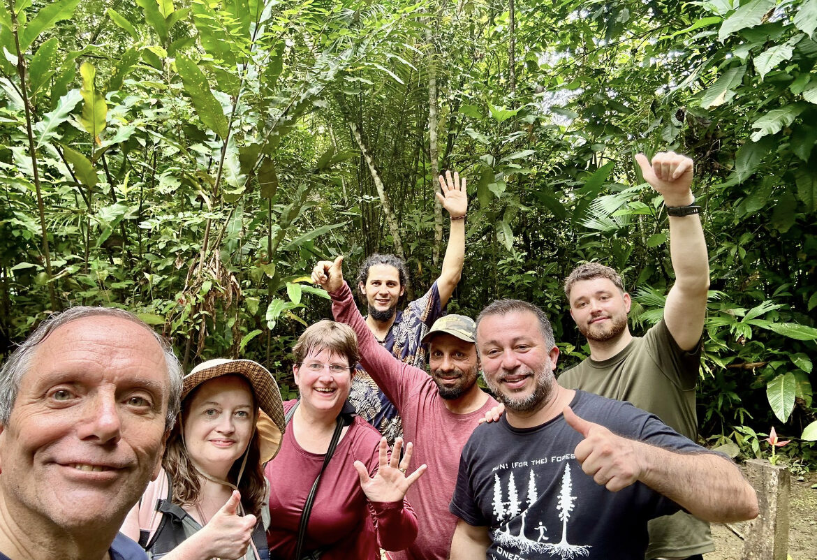 Charlie and guests in the rainforest